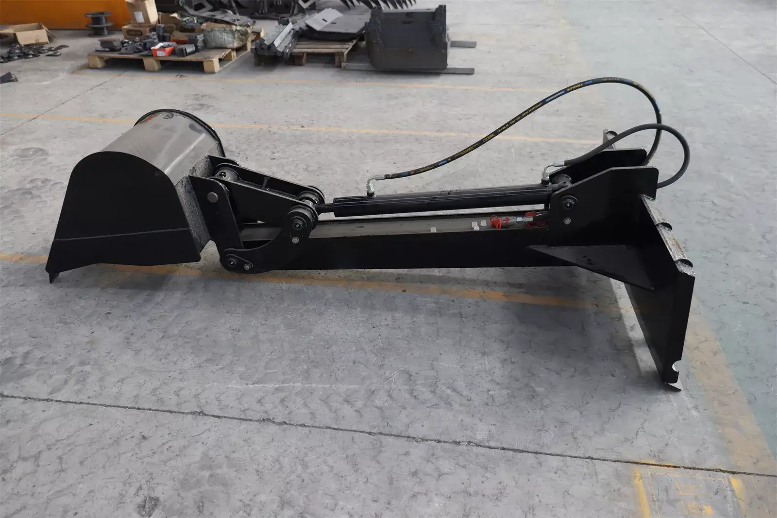 TYPHON STOMP Backhoe Attachment